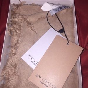 Beautiful brand new blush colored scarf